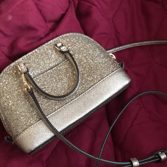 Rose gold Coach purse. Only used twice. - Picture 2 of 3